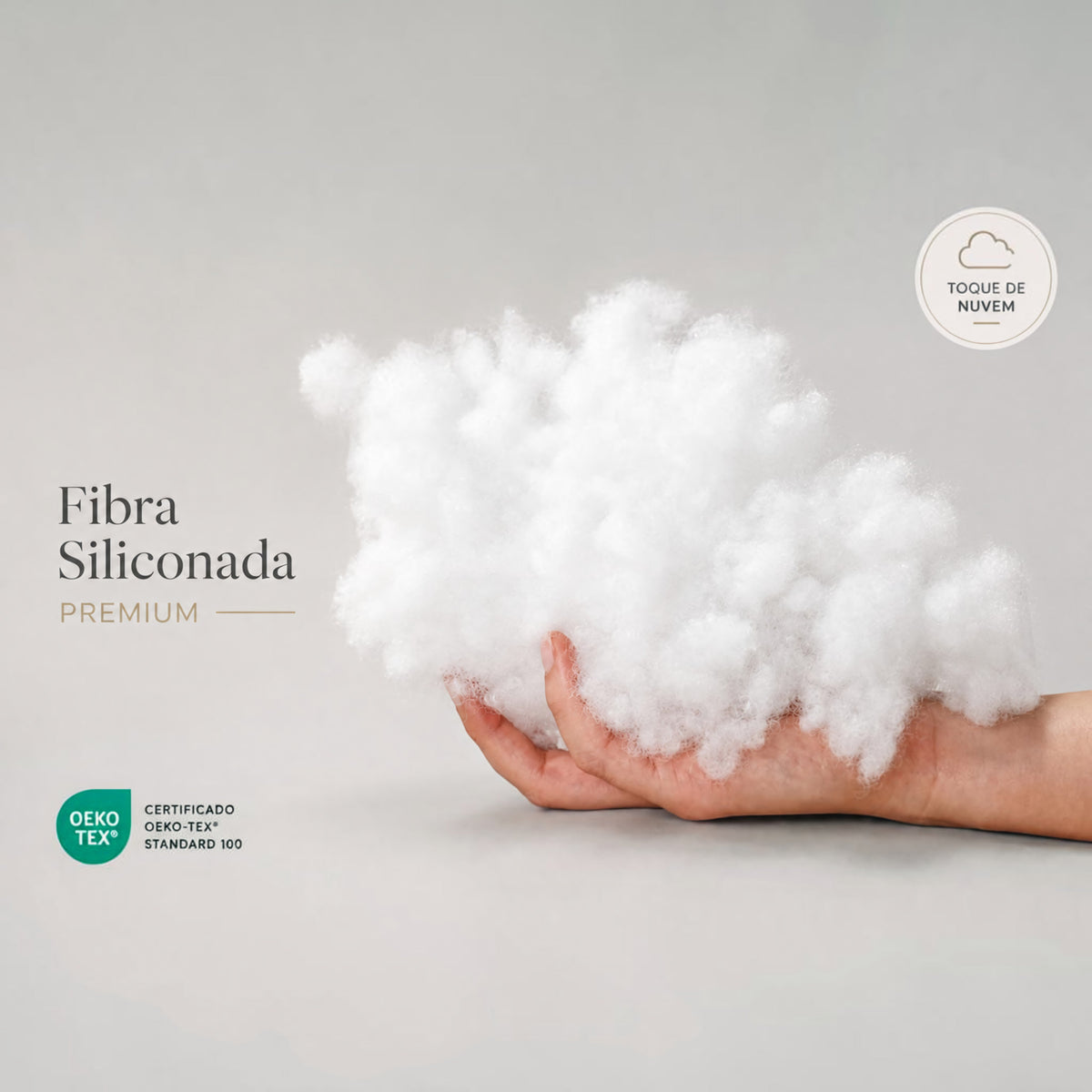 Hand holding premium white siliconised fibre from Oporto Amigurumi for soft doll and craft stuffing